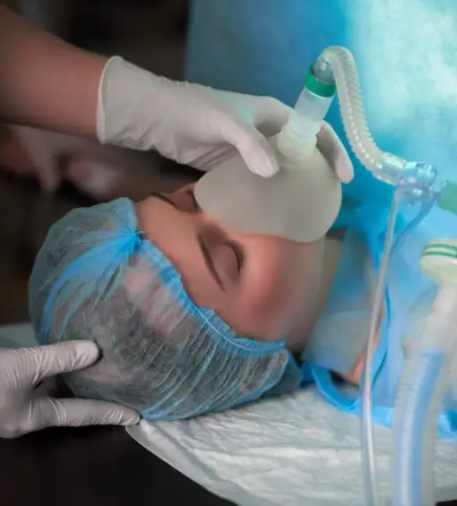 doctor treating boy's injured ankle urgent care