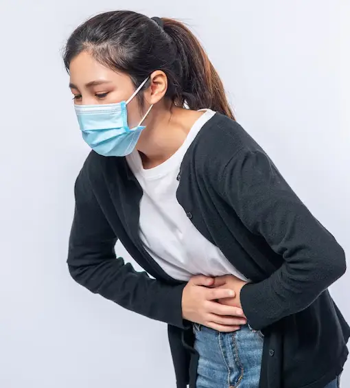 doctor treating boy's injured ankle urgent care