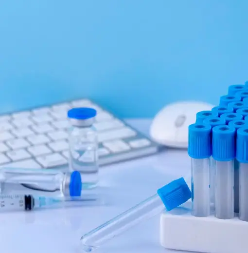 doctor treating boy's injured ankle urgent care